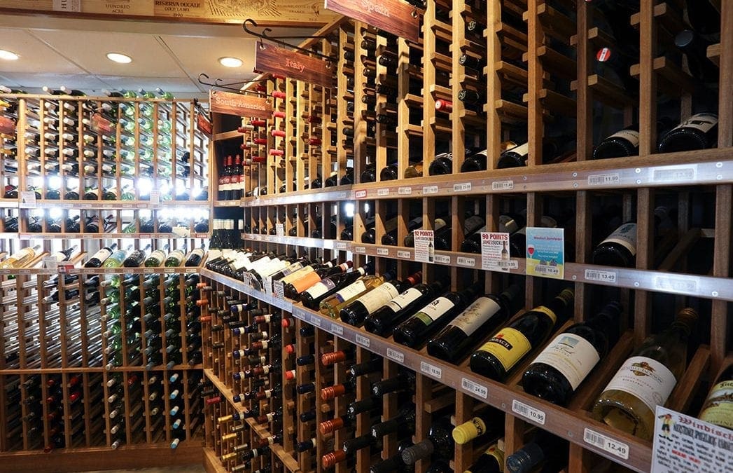 Bottles of wine in racks at Harrys liquor store