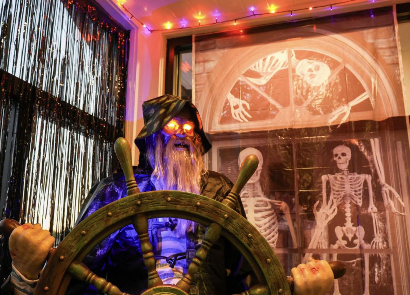 Harry's Boo Bar pirate skeleton at the ship's wheel