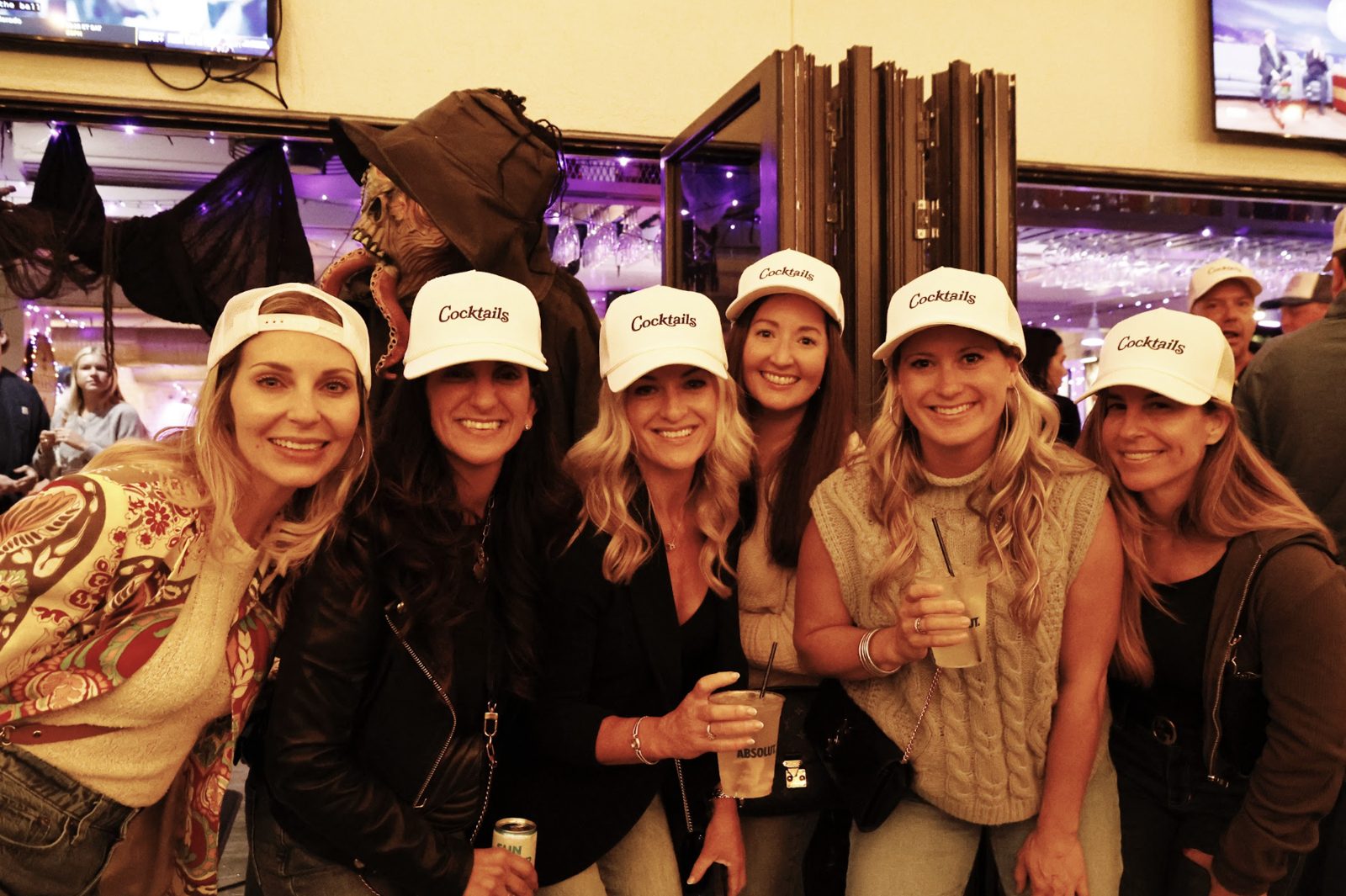 Friends celebrating Halloween at Harry's Boo Bar